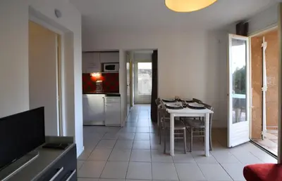 Cuisine ou kitchenette dans l'établissement Résidence U Nebbiu