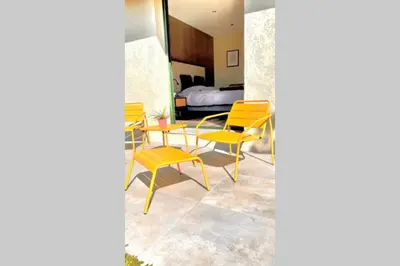 Coin salon dans l'établissement VILLA CORSA**** PISCINE VUE MER PANORAMIQUE