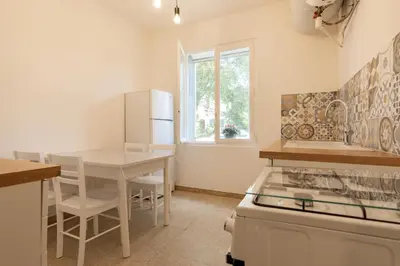 Cuisine ou kitchenette dans l'établissement Résidence Poggiole