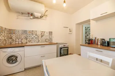 Cuisine ou kitchenette dans l'établissement Résidence Poggiole
