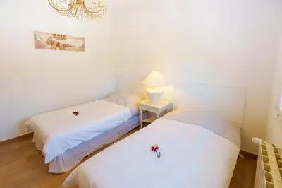 Un ou plusieurs lits dans un hébergement de l'établissement Villa Roma