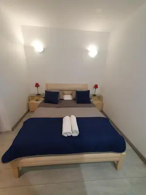 Un ou plusieurs lits dans un hébergement de l'établissement Cap Corse uribellinu 1, paisible vue mer, montagne