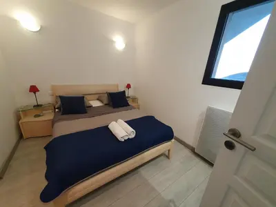 Un ou plusieurs lits dans un hébergement de l'établissement Cap Corse uribellinu 1, paisible vue mer, montagne