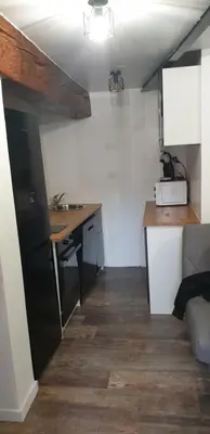 Cuisine ou kitchenette dans l'établissement Charmant petit studio proche départ GR20