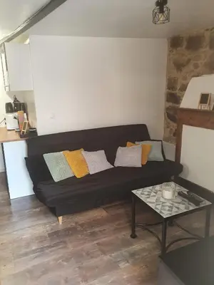 Coin salon dans l'établissement Charmant petit studio proche départ GR20