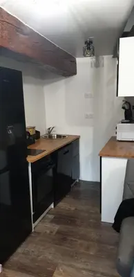 Cuisine ou kitchenette dans l'établissement Charmant petit studio proche départ GR20