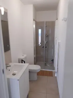 Salle de bains dans l'établissement Studio les pieds dans l'eau vue sur mer