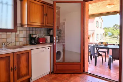 Cuisine ou kitchenette dans l'établissement Pinea Mare