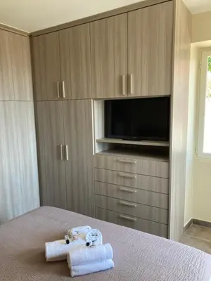 Télévision ou salle de divertissement dans l'établissement DUPLEX 4 PERSONNES Clim Wifi Parking