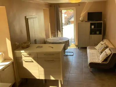 Coin salon dans l'établissement DUPLEX 4 PERSONNES Clim Wifi Parking