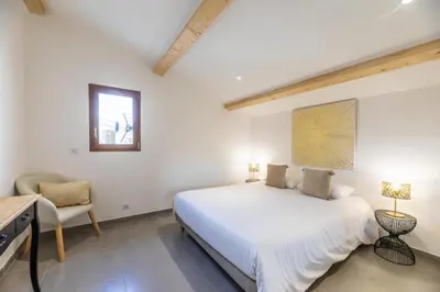 Un ou plusieurs lits dans un hébergement de l'établissement La Listrella Residence & Spa