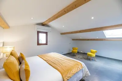 Un ou plusieurs lits dans un hébergement de l'établissement La Listrella Residence & Spa