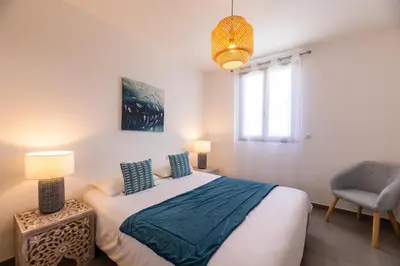Un ou plusieurs lits dans un hébergement de l'établissement La Listrella Residence & Spa