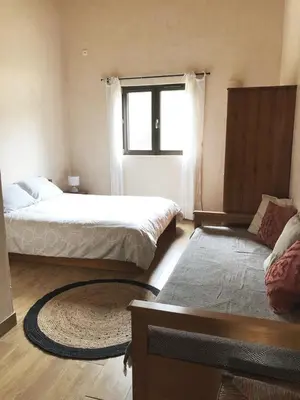 Un ou plusieurs lits dans un hébergement de l'établissement Villa familiale entre mer et montagne Corse
