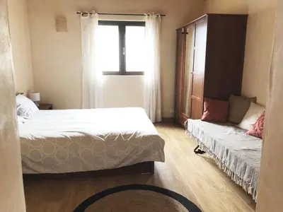 Un ou plusieurs lits dans un hébergement de l'établissement Villa familiale entre mer et montagne Corse
