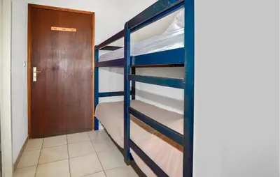 Un ou plusieurs lits dans un hébergement de l'établissement 1 Bedroom Amazing Apartment In Prunete