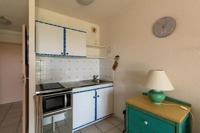 Cuisine ou kitchenette dans l'établissement Arinella