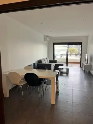Coin salon dans l'établissement T3 moderne et spacieux à BASTIA