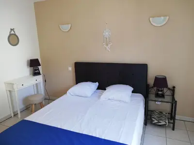 Un ou plusieurs lits dans un hébergement de l'établissement Chambres d'hôtes Multari