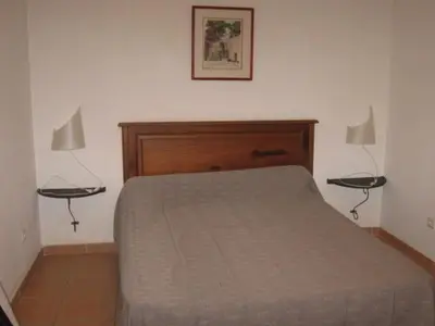 Un ou plusieurs lits dans un hébergement de l'établissement GITE DES FRANCISCAINS-Imiza