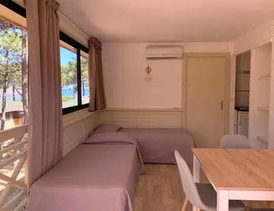 Coin salon dans l'établissement Résidence Les Pins
