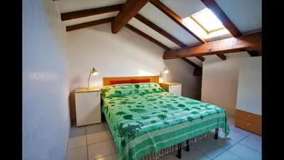 Un ou plusieurs lits dans un hébergement de l'établissement Marina Corsa Residence Apartment 3 rooms 6 persons 150 m sandy beach Ghisonaccia