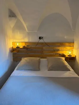 Un ou plusieurs lits dans un hébergement de l'établissement Maisonette Palazzu Pigna