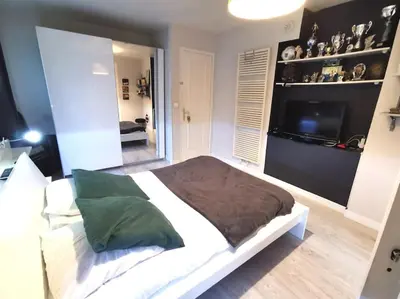 Un ou plusieurs lits dans un hébergement de l'établissement Casa Galli- Belle villa coeur de ville avc piscine