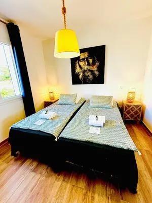 Un ou plusieurs lits dans un hébergement de l'établissement Casamarina2a Maisons bord de mer