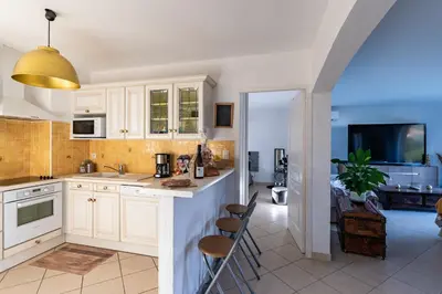 Cuisine ou kitchenette dans l'établissement Aria - Vue Mer