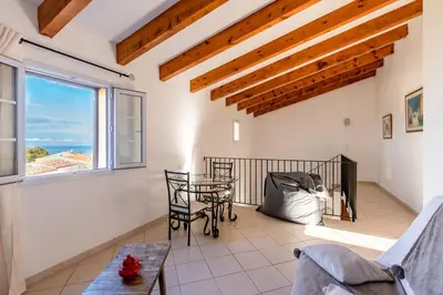 Coin salon dans l'établissement Aria - Vue Mer