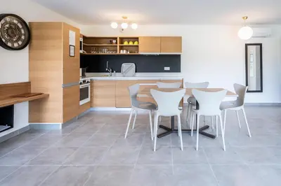 Cuisine ou kitchenette dans l'établissement hôtel résidence a torra