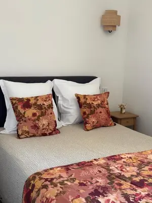 Un ou plusieurs lits dans un hébergement de l'établissement Hotel U Campanile
