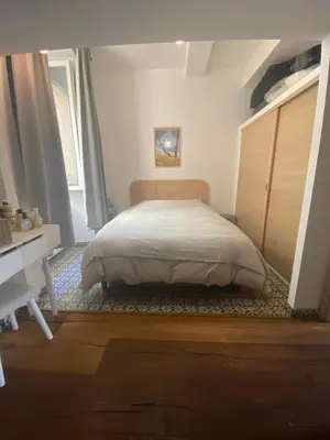 Un ou plusieurs lits dans un hébergement de l'établissement Appartement hypercentre Bastia vue mer et petite terrasse