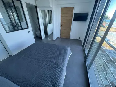 Un ou plusieurs lits dans un hébergement de l'établissement maison de bord de mer cap corse