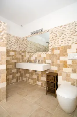 Salle de bains dans l'établissement Alzitone