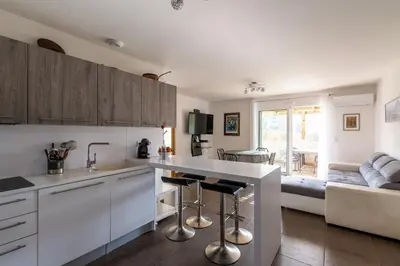 Cuisine ou kitchenette dans l'établissement Le Clos d'Oletta