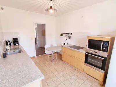 Cuisine ou kitchenette dans l'établissement Bel appartement centre ville 3 chambres