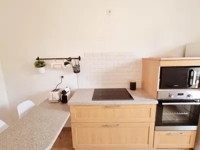 Cuisine ou kitchenette dans l'établissement Bel appartement centre ville 3 chambres