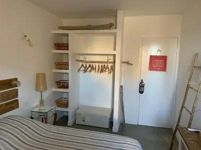 Un ou plusieurs lits dans un hébergement de l'établissement Bel appartement idéalement situé en Haute Corse