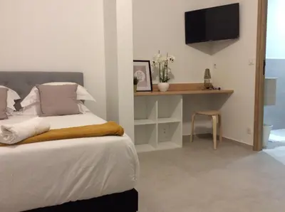 Un ou plusieurs lits dans un hébergement de l'établissement STUDIO A 2 MIN DES PLAGES