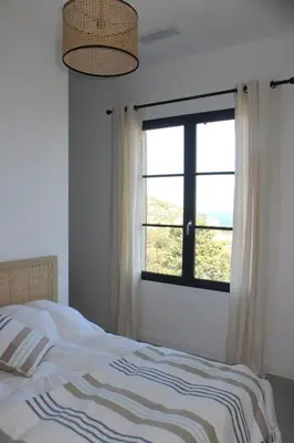 Un ou plusieurs lits dans un hébergement de l'établissement Villa Hugo