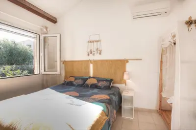 Un ou plusieurs lits dans un hébergement de l'établissement Kazamasavani - Belle maison proche mer