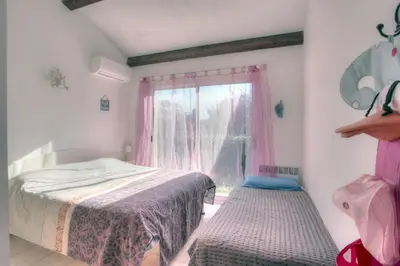 Un ou plusieurs lits dans un hébergement de l'établissement Kazamasavani - Belle maison proche mer