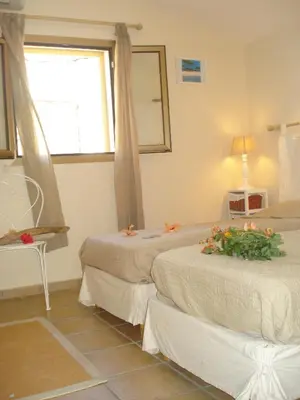 Un ou plusieurs lits dans un hébergement de l'établissement Le Cabanon