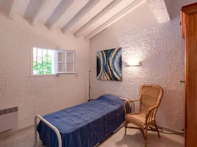 Un ou plusieurs lits dans un hébergement de l'établissement Holiday Home Villa Irène by Interhome