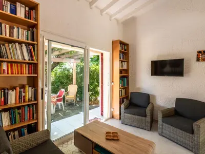 Coin salon dans l'établissement Holiday Home Villa Irène by Interhome
