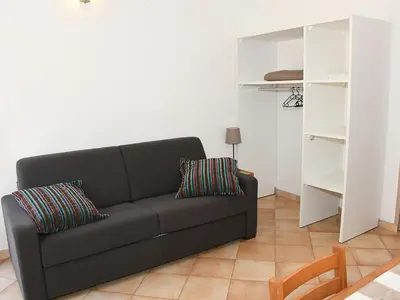 Coin salon dans l'établissement Holiday Home Studio cabine Type B by Interhome