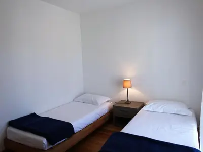 Un ou plusieurs lits dans un hébergement de l'établissement Apartment T3 vue cap by Interhome