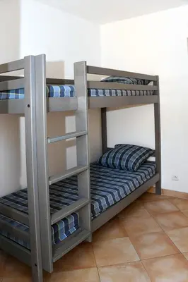 Un ou plusieurs lits dans un hébergement de l'établissement Holiday Home T3 Cabine by Interhome